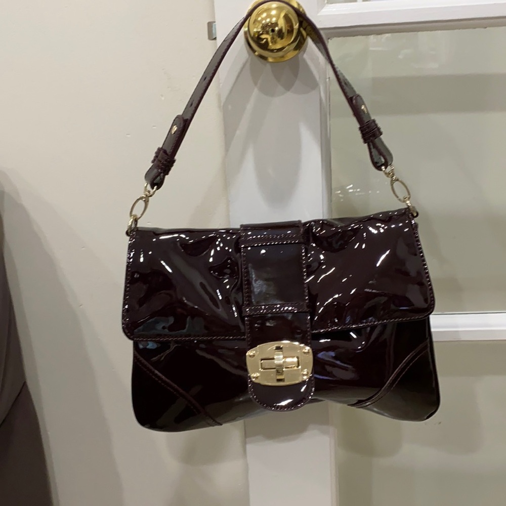 New Sandra Robert’s wine patent leather.